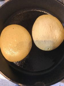 Flourless oat banana protein pancakes in pan