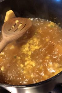 big ginger piece in vegan soup pot