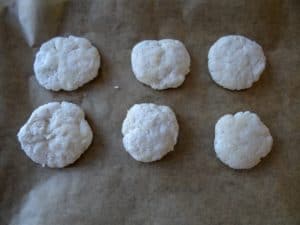 Coconut cookies in oven tray