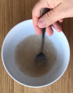 Stir psyllium husk in boiling water