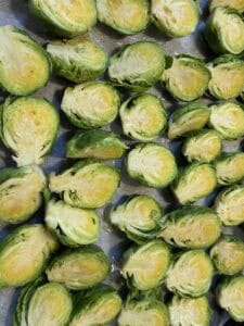 Brussel sprouts raw facing up on a tray bake