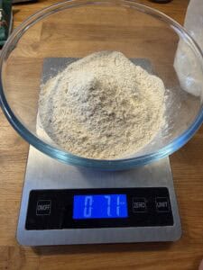 Vital wheat gluten on a bowl, and a scale